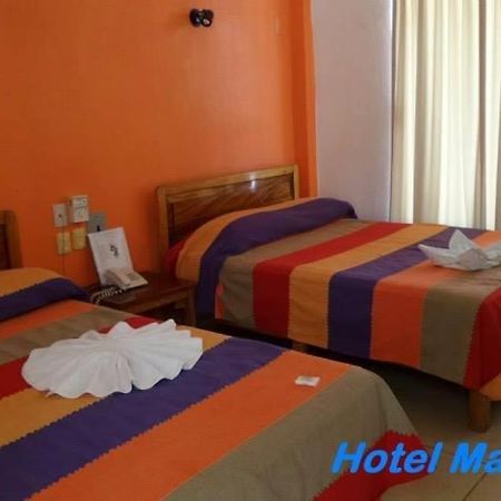 Hotel Martina'S ปูแอร์โตเอสกอนดิโด ภายนอก รูปภาพ