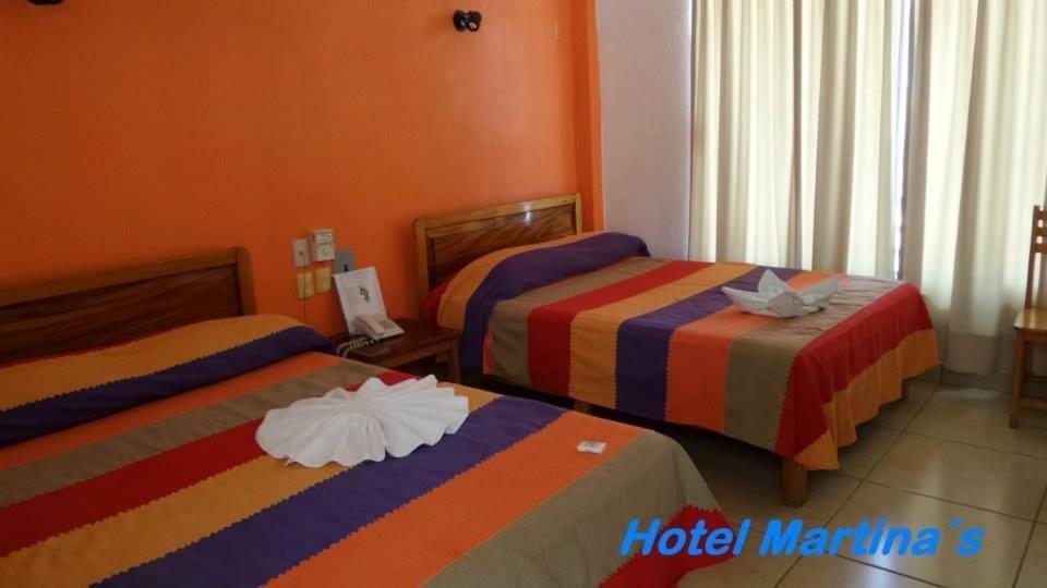 Hotel Martina'S ปูแอร์โตเอสกอนดิโด ภายนอก รูปภาพ